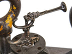 wall-mount oversized late 19th century ornamental cast iron copper-plated figural coat hook with grotesque