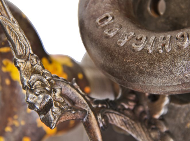 wall-mount oversized late 19th century ornamental cast iron copper-plated figural coat hook with grotesque