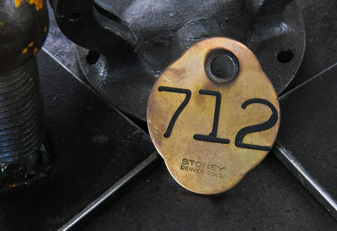 early 20th century antique american solid bronze metal double-sided light incised ywca hotel oversized door key fob