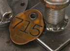 single antique american die cut bronze metal double-sided lightly incised chicago ywca hotel building door key fob