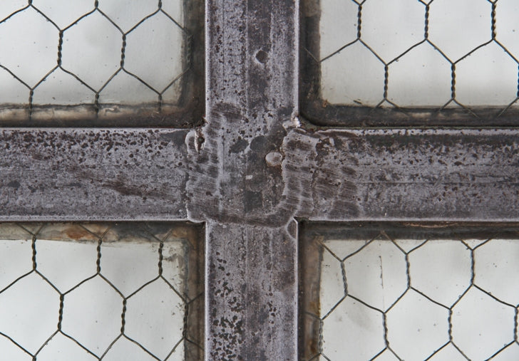 highly sought after all original and intact c. 1905 heavily reinforced "chicken wire" sandwich glass industrial six-pane steel window
