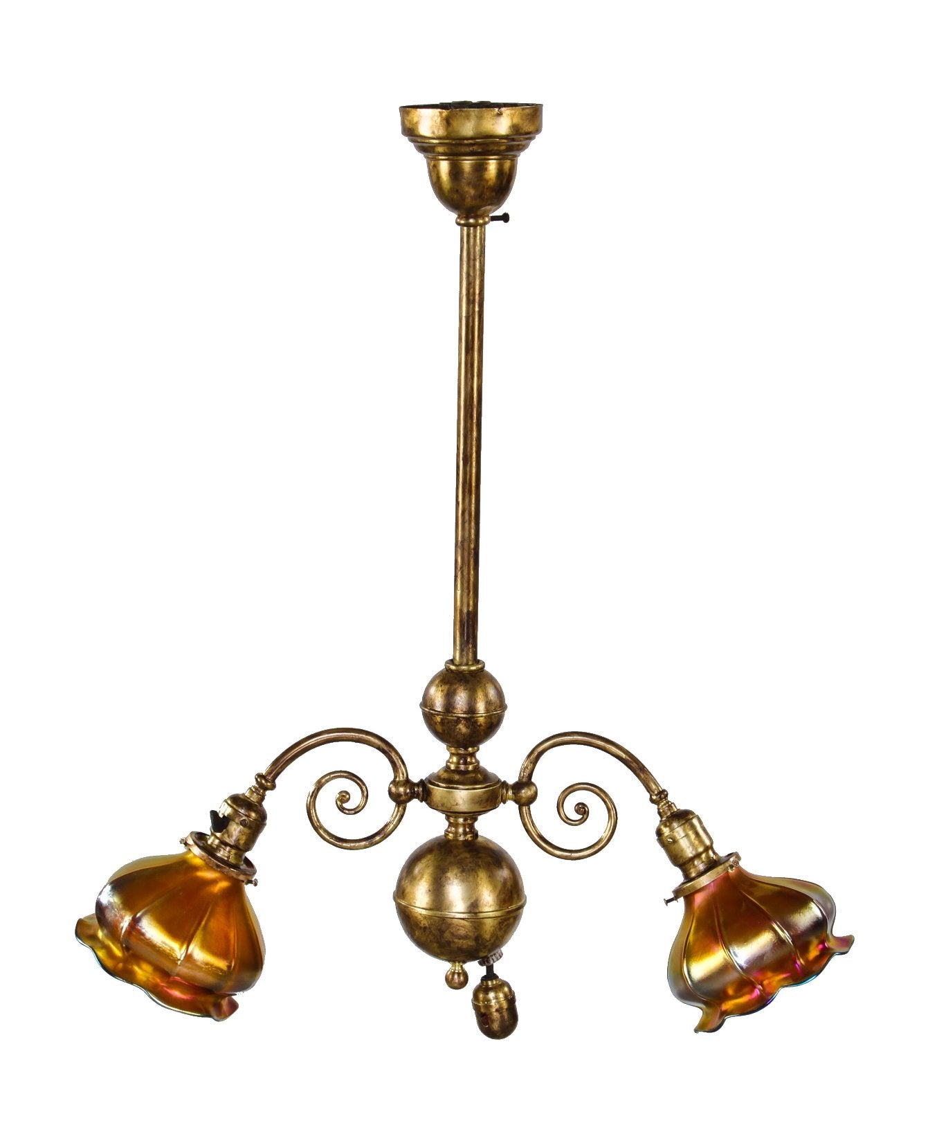 american c. early 20th century ornamental wrought yellow brass two-arm chicago athletic club billiard room ceiling fixture with gold aurene steuben shades