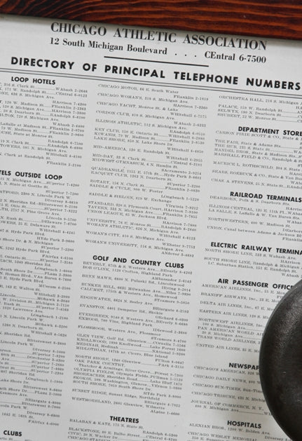 framed c. 1950's vintage american chicago athletic association building lobby "directory of phone numbers" for downtown destinations