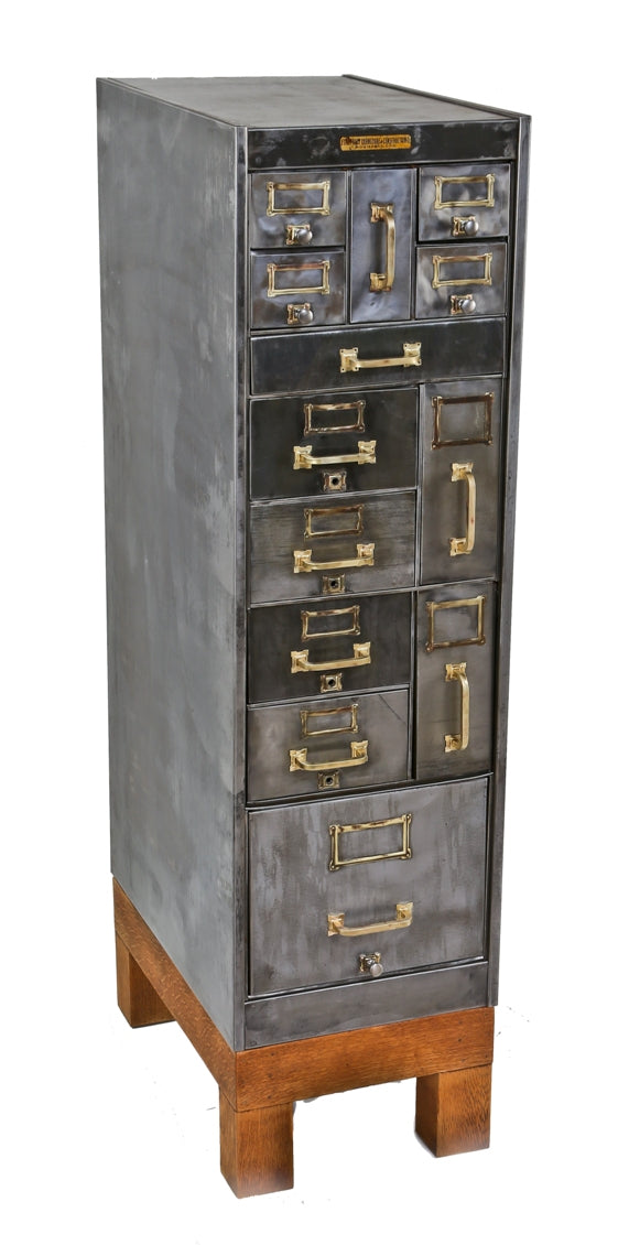 refinished early 20th century american industrial compartmentalized freestanding heavy gauge steel cabinet with four-legged quartered oak wood base