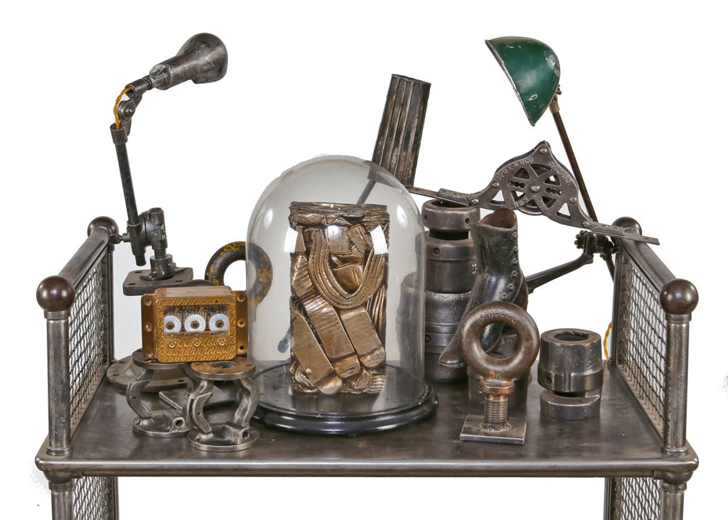 visually distinctive crushed brass metal "briquette" display object consisting of recycled radiator components