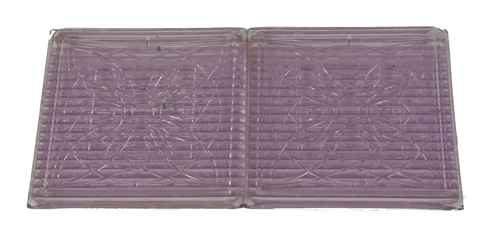 two original early 20th century american frank lloyd wright-designed "sun-purple" ornamented luxfer prism tiles