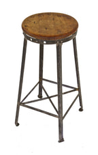 original c. 1930's american antique industrial four-legged riveted joint angled steel freestanding factory stool with maple wood seat