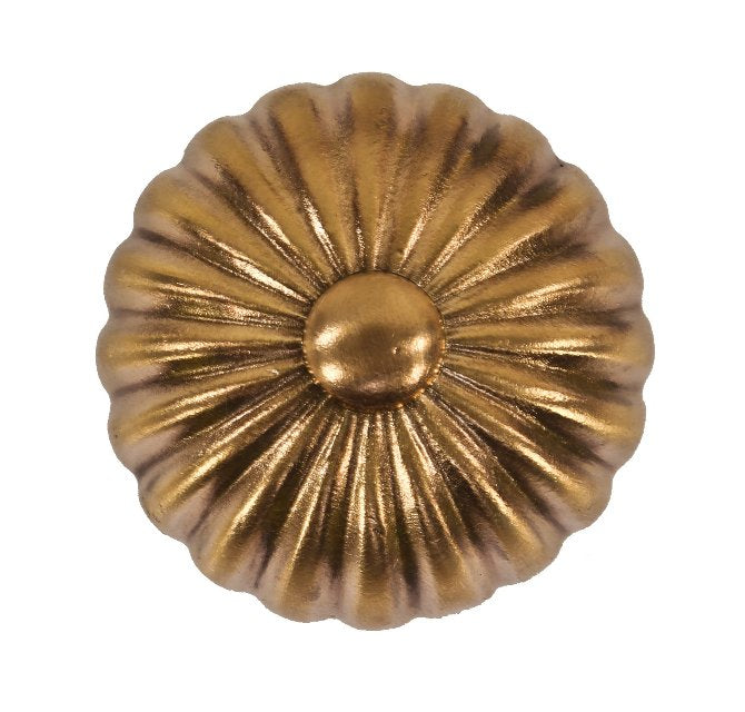 single late 19th century american ornamental cast bronze radially-designed doorknob with a centrally located button