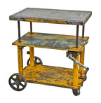 nicely distressed yellow painted c. 1940's west side chicago factory all-welded mobile "portelevator" hand crank die cart with solid steel deck