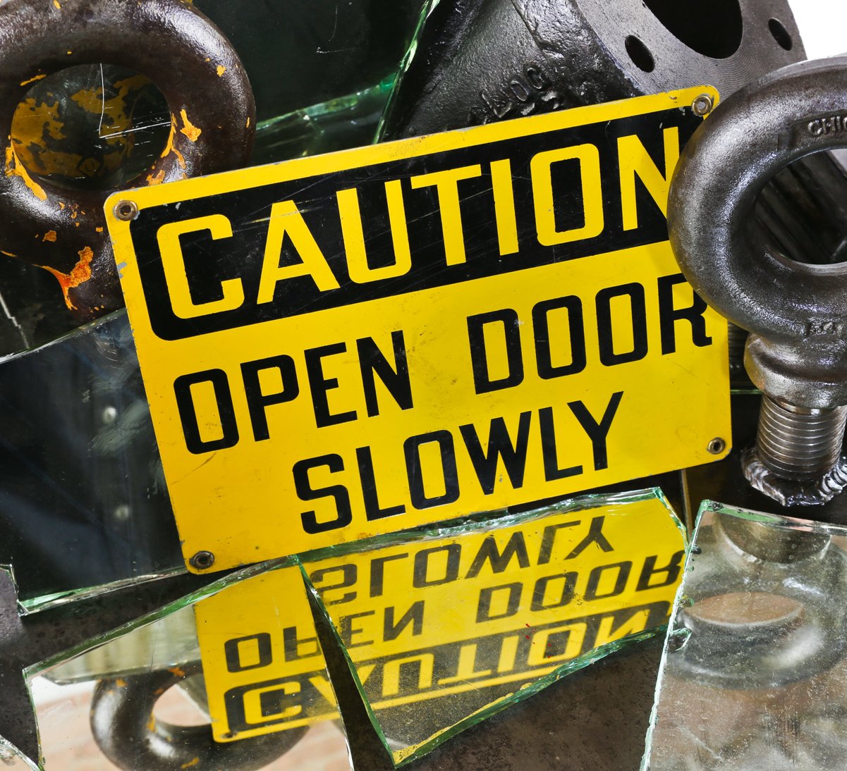 vintage american industrial brightly colored yellow "open door slowly" factory cautionary wall-mount steel sign with intact grommets