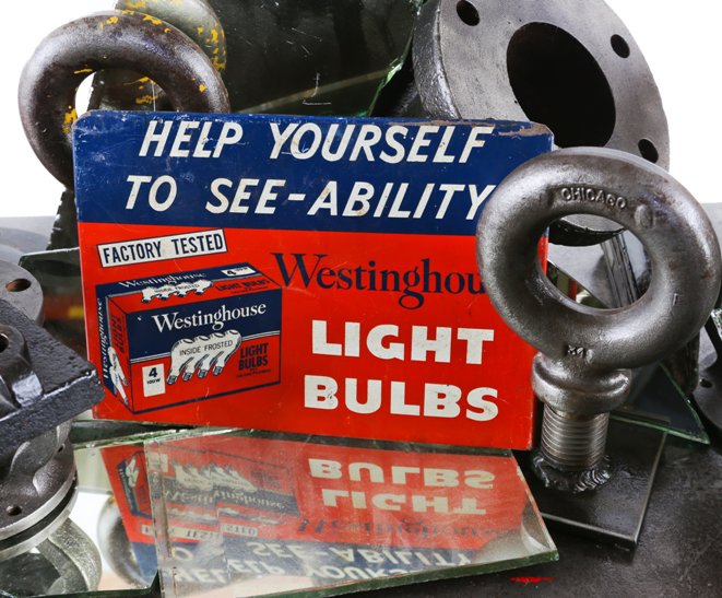 original early 1940's american hardware store single-sided stamped steel westinghouse light bulb advertising display sign