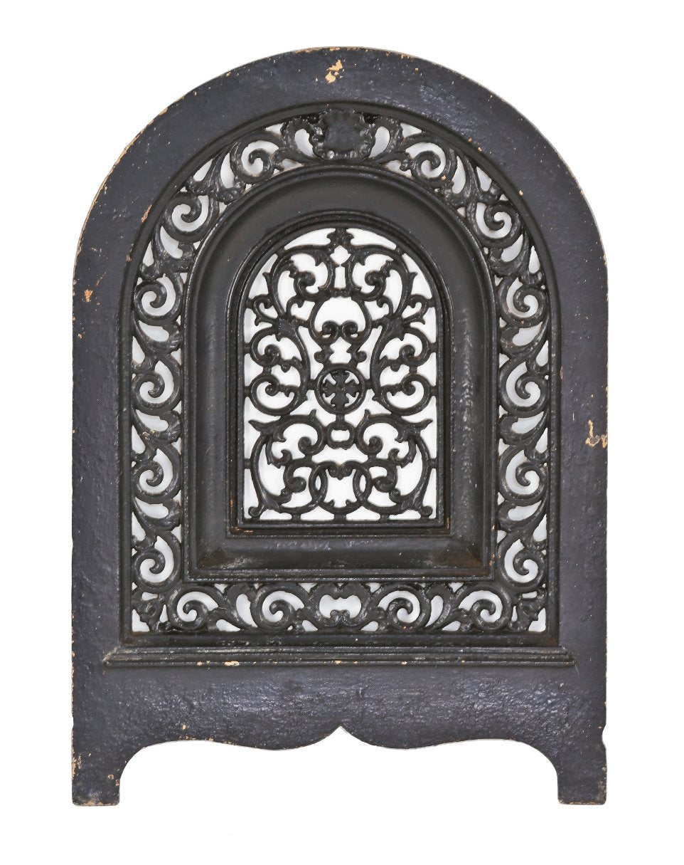 NYC c. 19th century brownstone interior residential ornamental cast iron perforated arch top parlor fireplace summer cover