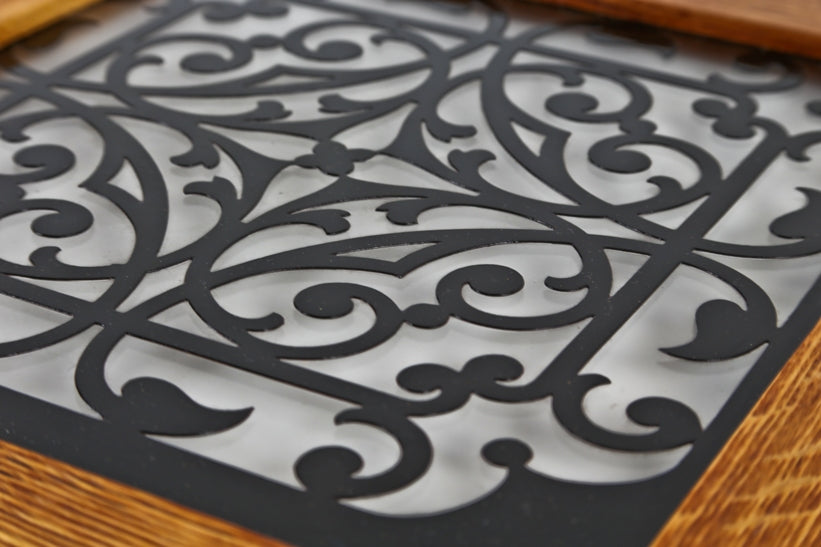 19th century high victorian lightly etched "ornamental panel" with amethyst-colored flash glass accent secured in an oak wood frame