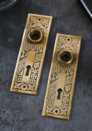 two matching original american 19th century wrought brass "ceylon" pattern interior residential doorknob backplate or escutcheons