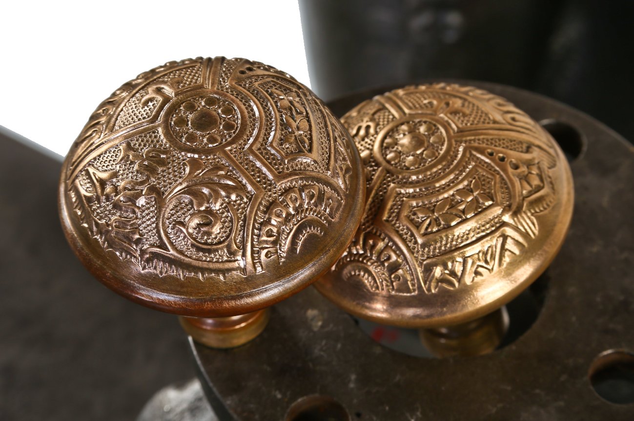 matching 19th century ornamental wrought brass "ceylon" pattern interior residential passage door knobset with steel spindle