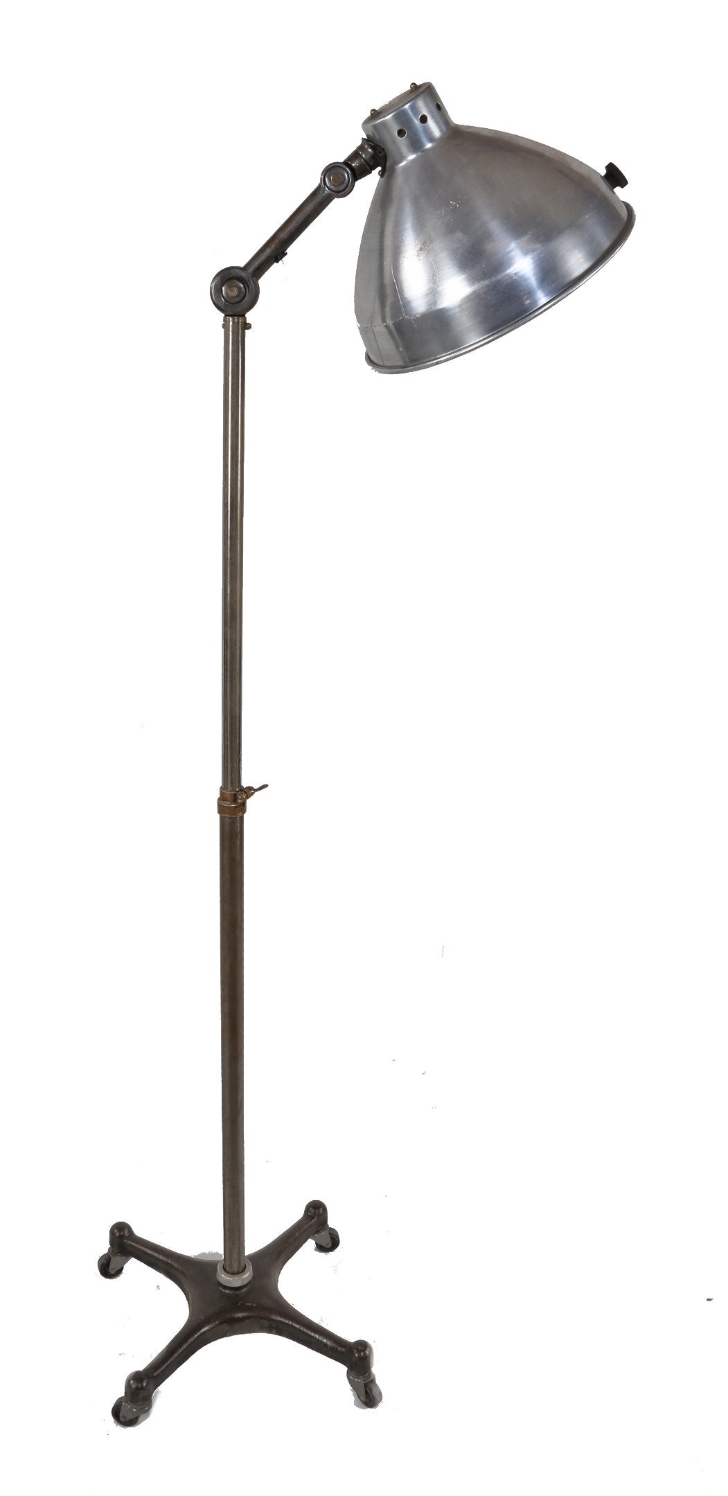 repurposed c. 1920's american medical "light therapy" adjustable height floor lamp with four-legged cast iron mobile base