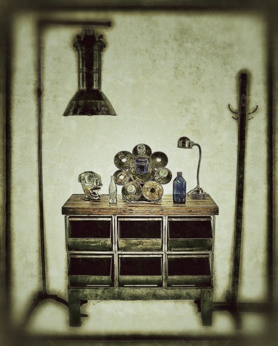 unusual repurposed american industrial brushed solid steel counter top sprocket wine bottle rack with angled iron support bracket