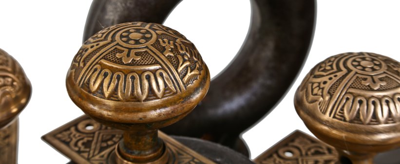 lot of late 19th century original and remarkably intact ornamental wrought brass "ceylon" pattern passage door escutcheons and doorknobs