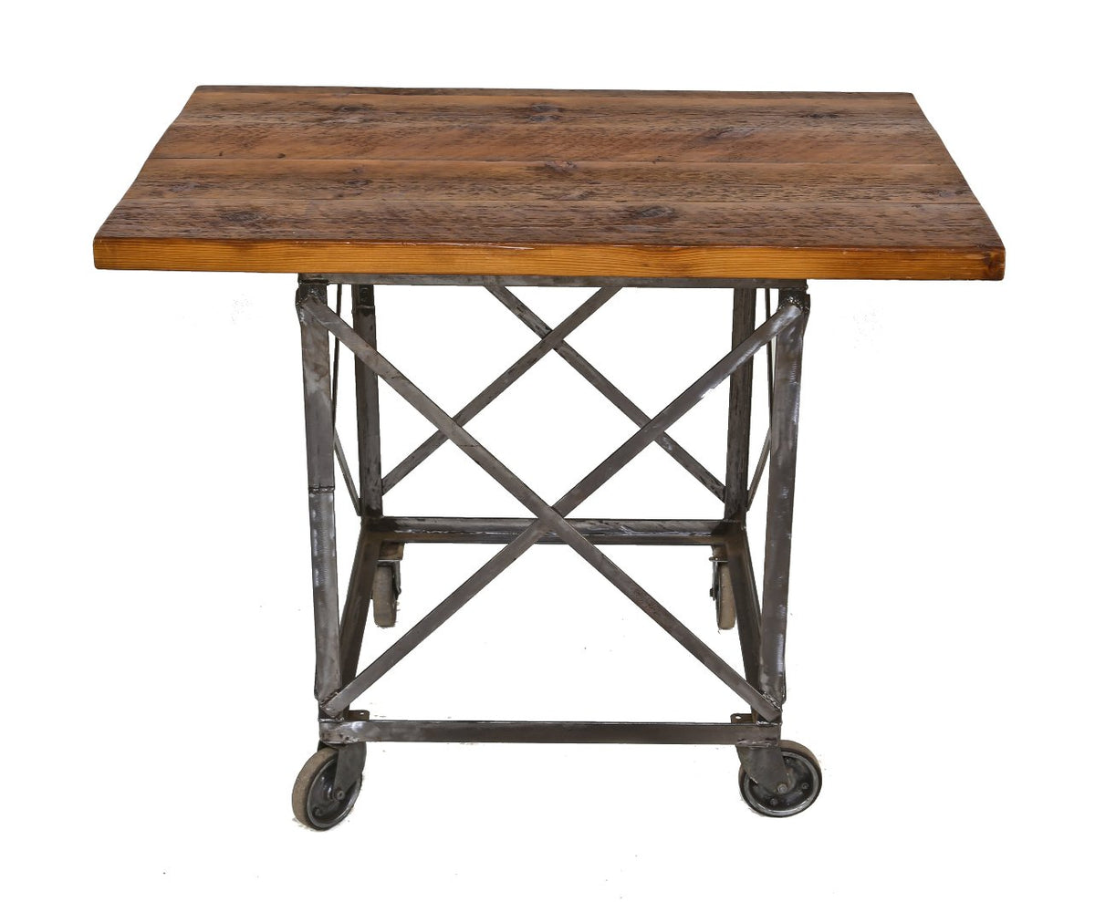 custom-built american industrial all-welded joint steel table with hardened rubber casters and newly added tabletop