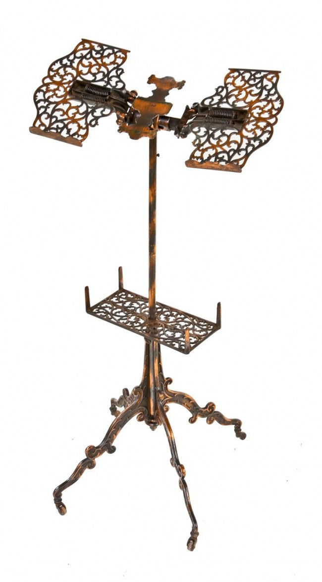 remarkably intact and all original 19th century filigree cast iron mobile combination reading and dictionary stand with largely intact oxidized copper-plated finish
