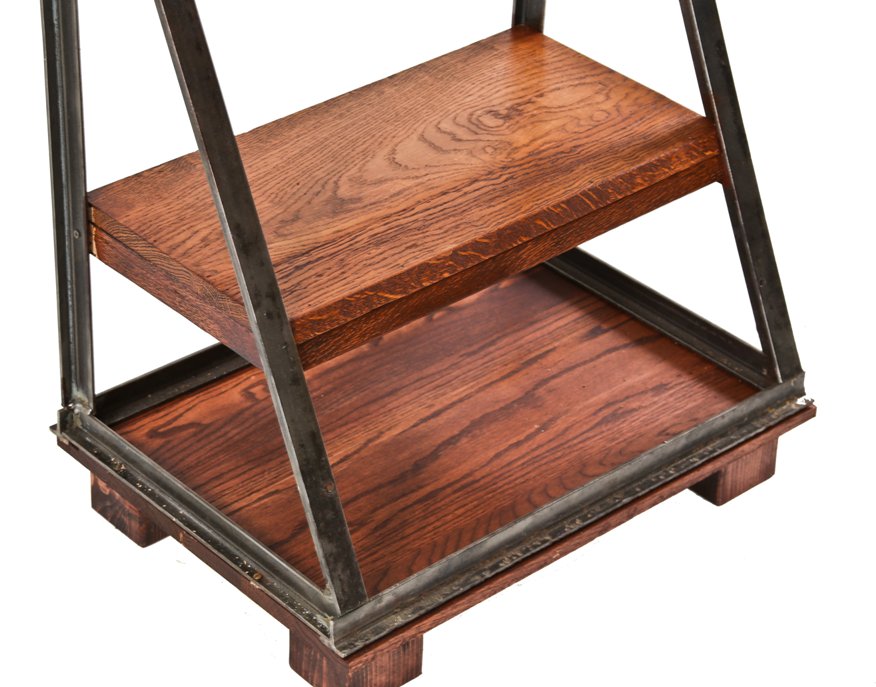 c. 1930's american chicago storefront sidewalk signicade repurposed into a stationary bookshelf with four-legged base