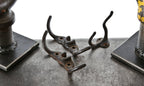 group of three early 20th century american industrial baked black enameled cast iron patented interior durand locker hooks