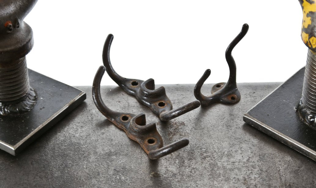 group of three early 20th century american industrial baked black enameled cast iron patented interior durand locker hooks
