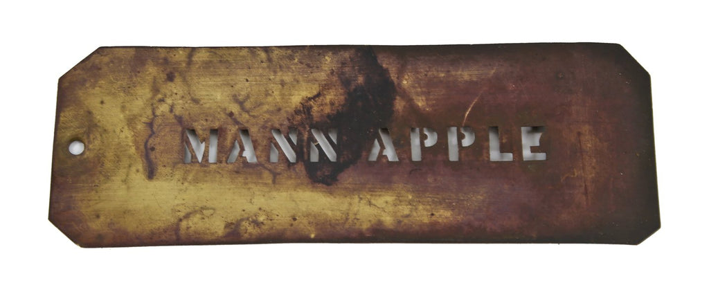 early 20th century single-sided wrought yellow brass "mann apple" stencil letter template with nicely aged surface patina
