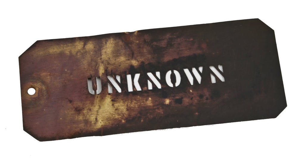 single-sided early 20th century antique american industrial wrought brass metal "unknown" letter stencil template plate