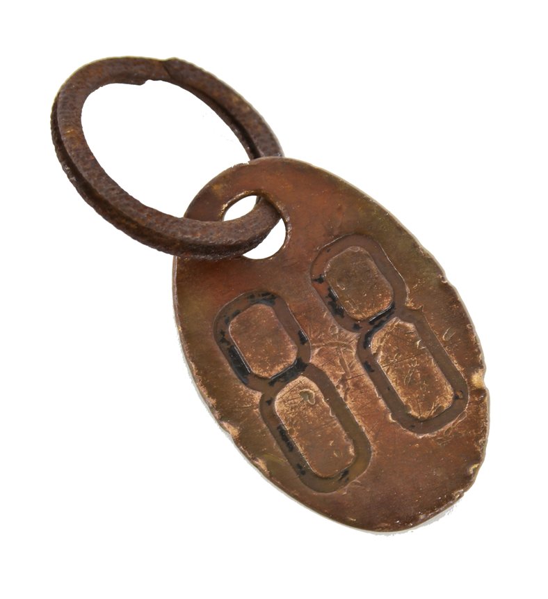 nicely aged original c. 1920's american industrial heavy wrought brass metal cow identification tag with double-sided numbers