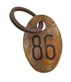 late 1920's original american industrial double-sided stamped wrought brass cow number identification tag with incised numbers