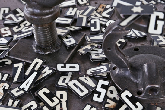 assorted american late 1930's diminutive enameled stamped steel "unitype" bulletin board letters and numbers