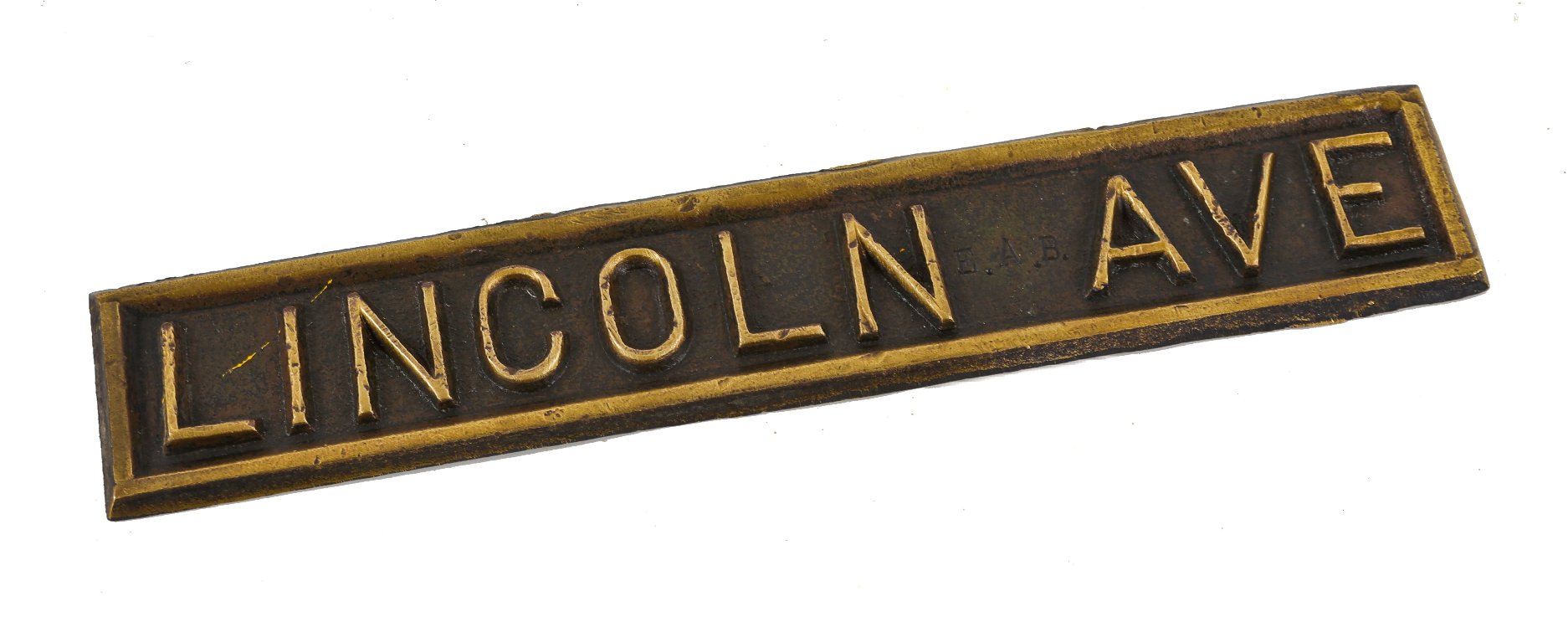 rare single-sided early 20th century american cast bronze lincoln avenue city sidewalk plaque with age appropriate surface wear