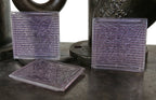 three matching all original early 20th century "sun-purple" luxfer exterior building transom prism tiles designed by frank lloyd wright