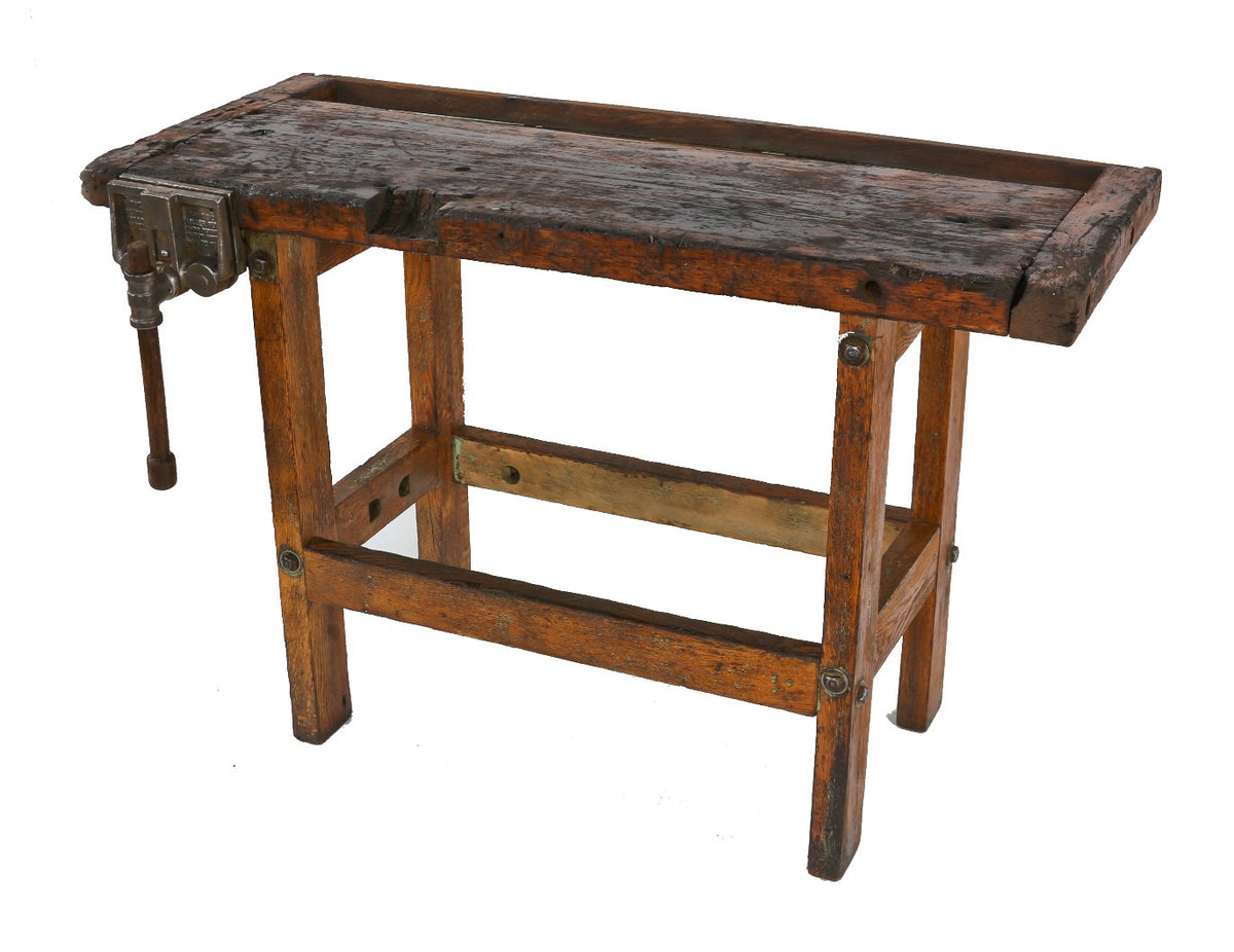 early 20th century american industrial weathered and worn oak wood stationary four-legged shop workbench with rapid acting vise