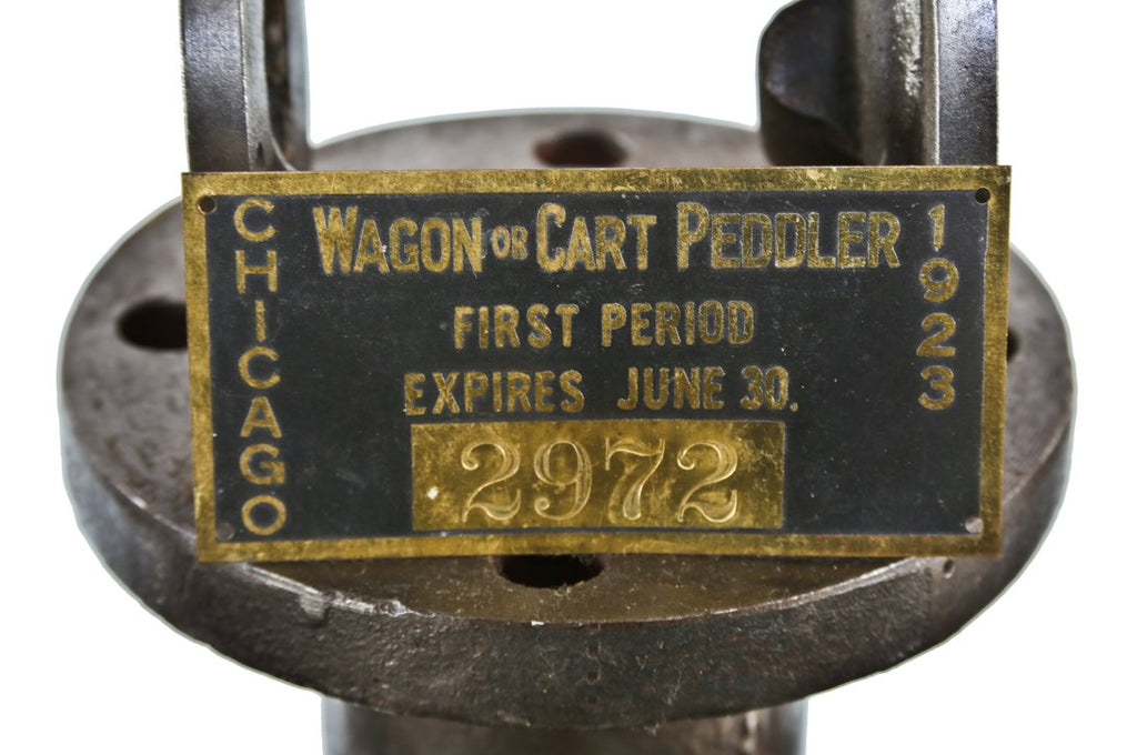 original rectangular-shaped c. 1920's american antique industrial single-sided surface mount stamped black enameled brass city of chicago peddler license