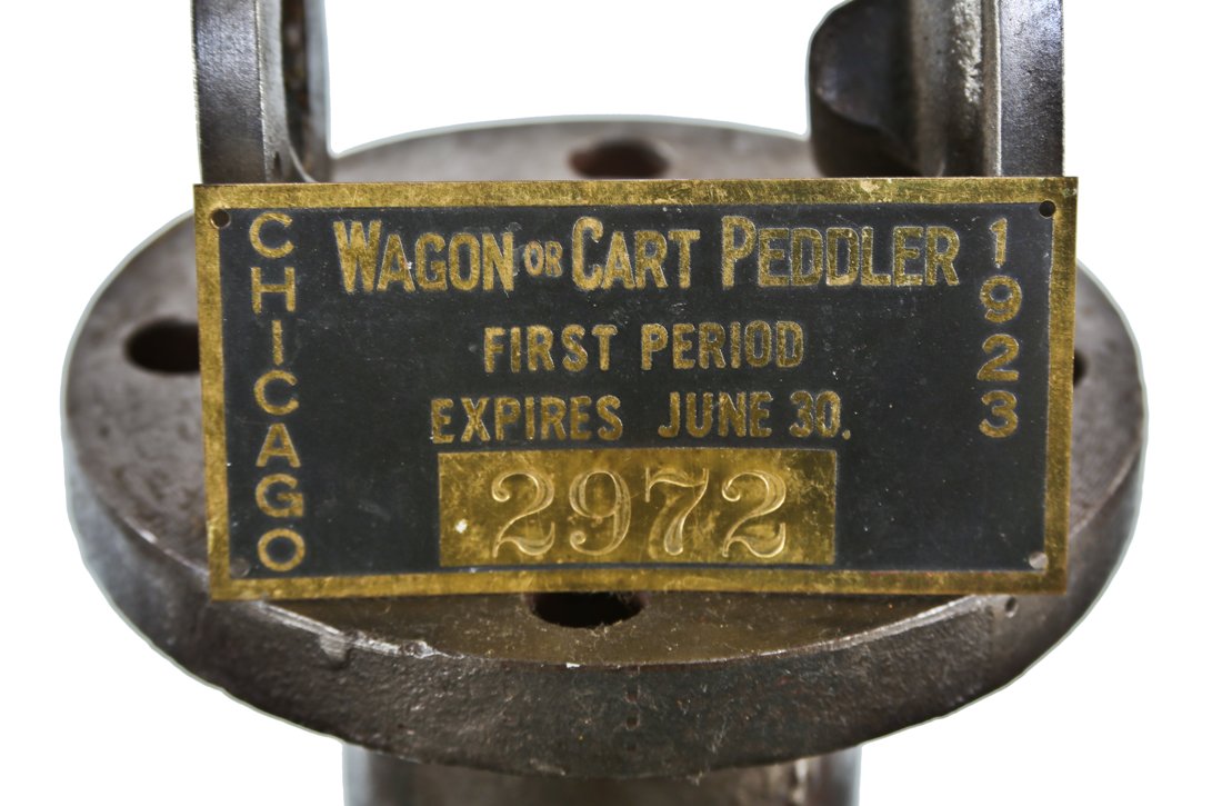 original rectangular-shaped c. 1920's american antique industrial single-sided surface mount stamped black enameled brass city of chicago peddler license