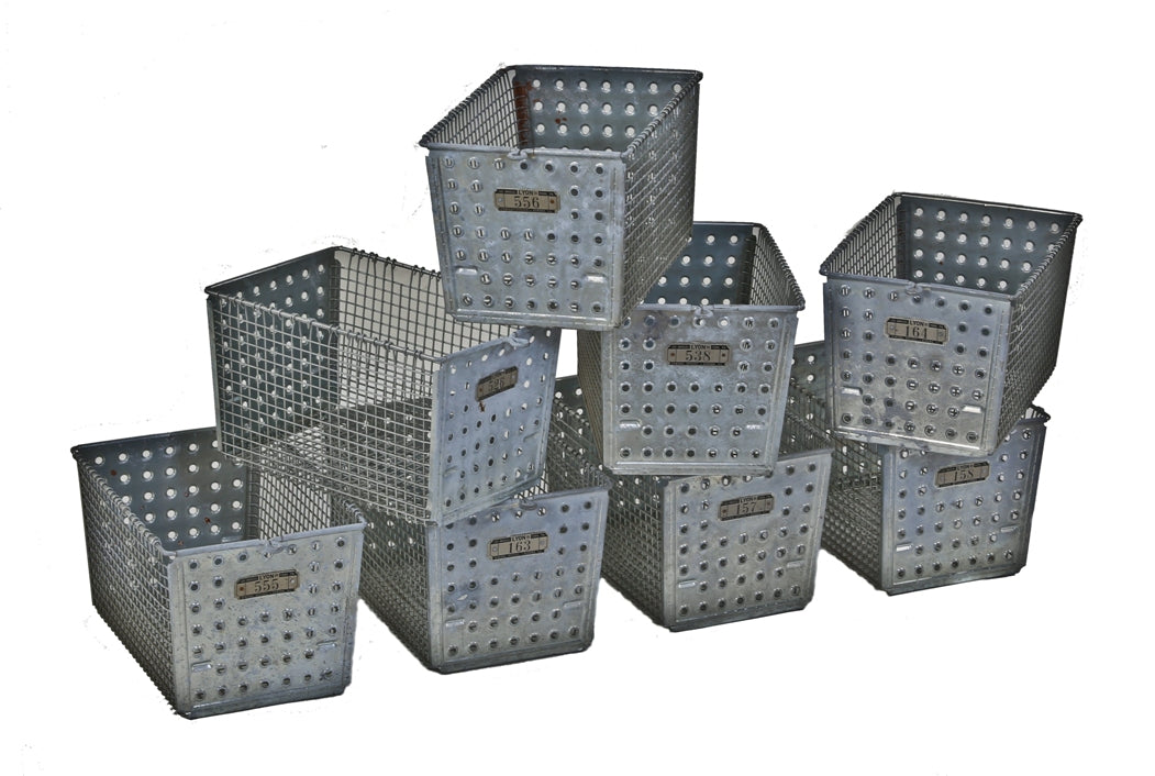 group of eight well-maintained matching american industrial galvanized steel detroit public school locker wire baskets