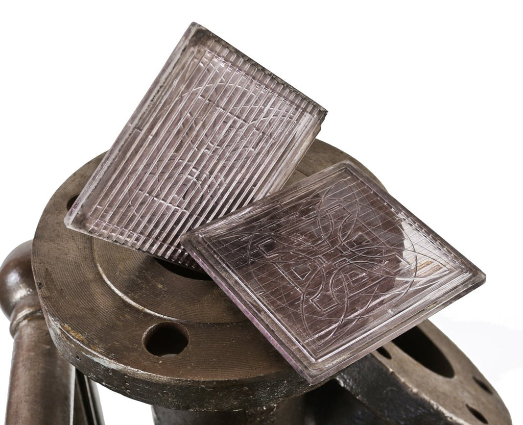 pair of frank lloyd wright-designed original antique amrican exterior building facade geometric flower prism glass tiles