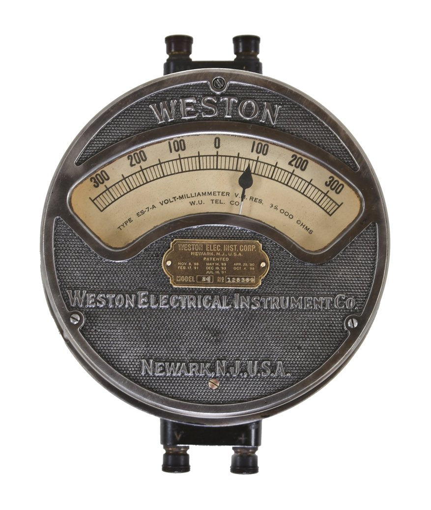 hard to find early 20th century american antique industrial cast iron weston voltmeter with original swing-out cast iron bracket