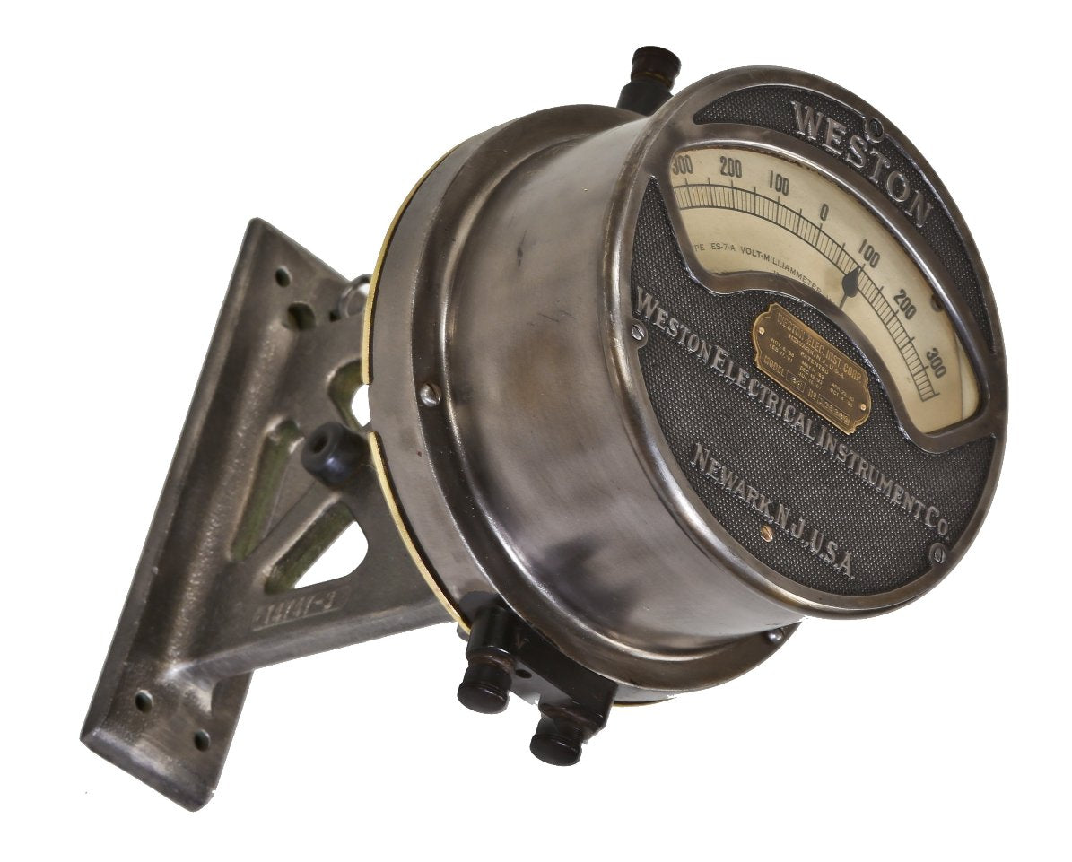 hard to find early 20th century american antique industrial cast iron weston voltmeter with original swing-out cast iron bracket