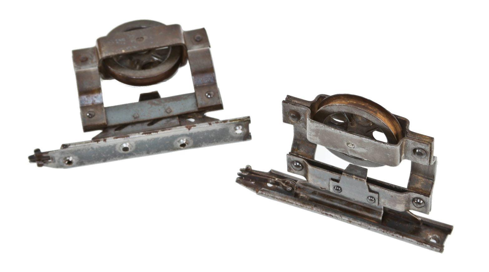 pair of original fully functional early 20th century riveted joint heavy gauge steel interior residential pocket door hangers