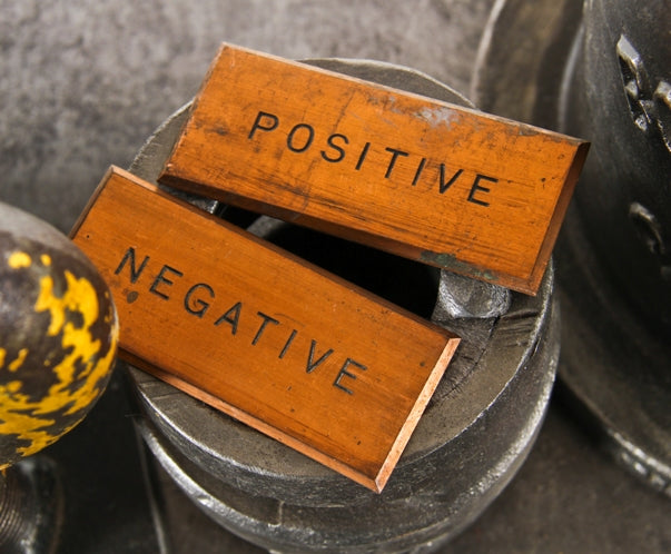 pair of c. 1908 original sub-basement open electric switchboard beveled edge solid copper "positive" and "negative" plaqes