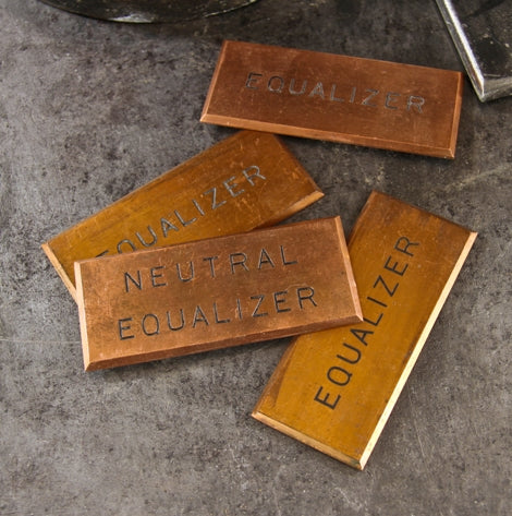 four original turn of the century american industrial beveled edge copper "equalizer" switchboard identification plaques with black enameled inlay