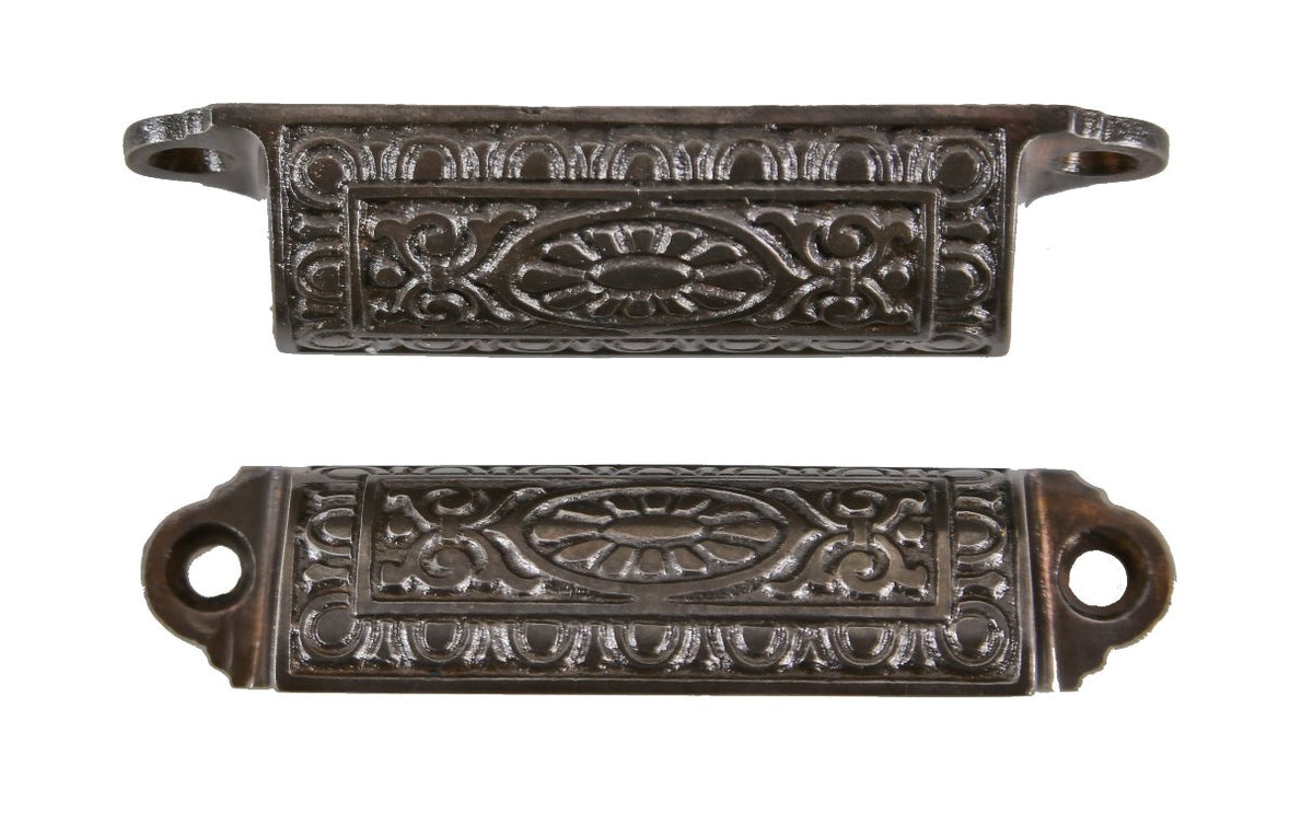 two matching original late 19th century american victorian era ornamental cast iron interior residential drawer or bin pulls