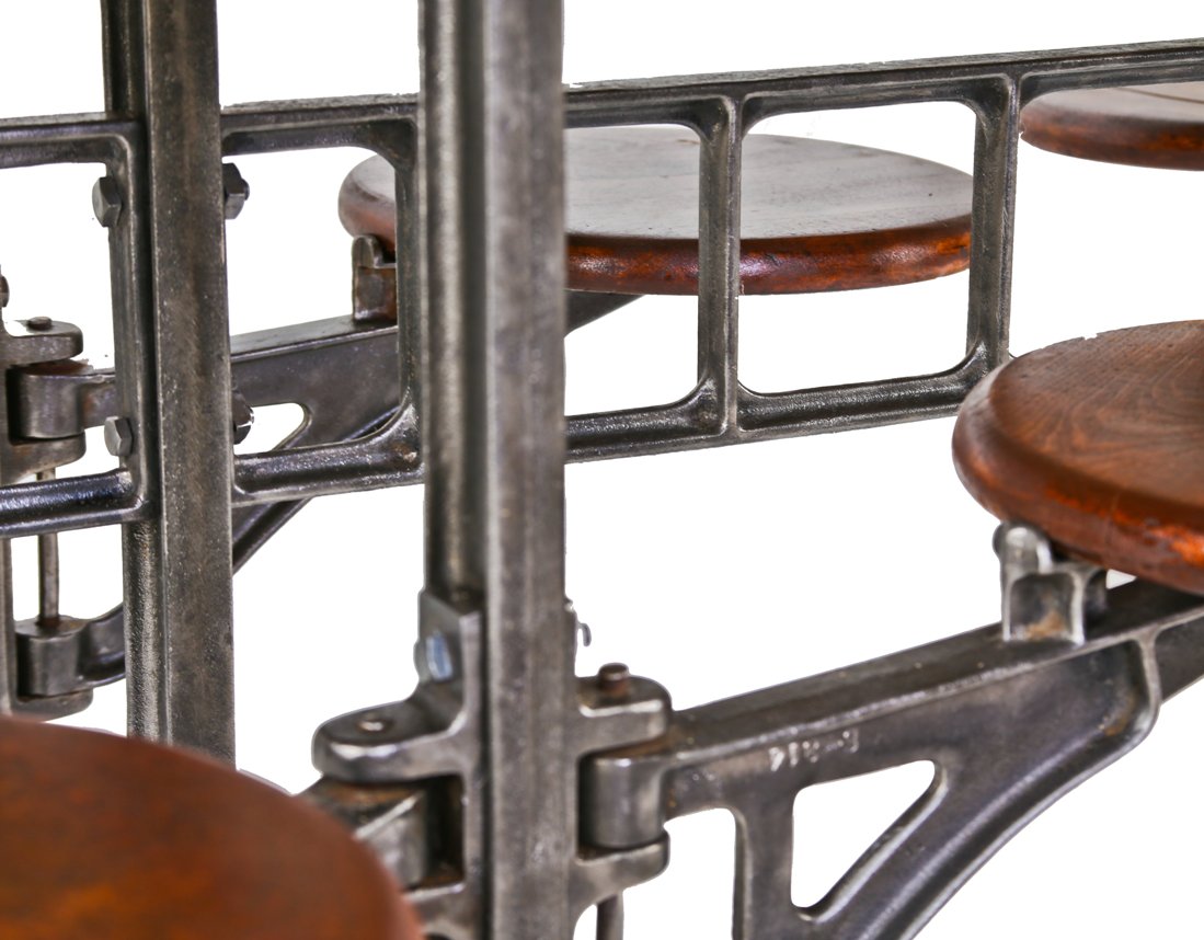 authentic and all original early 1920's american made industrial "sani" 8-seat swing-out stool "no. 314" sectional factory lunchroom table