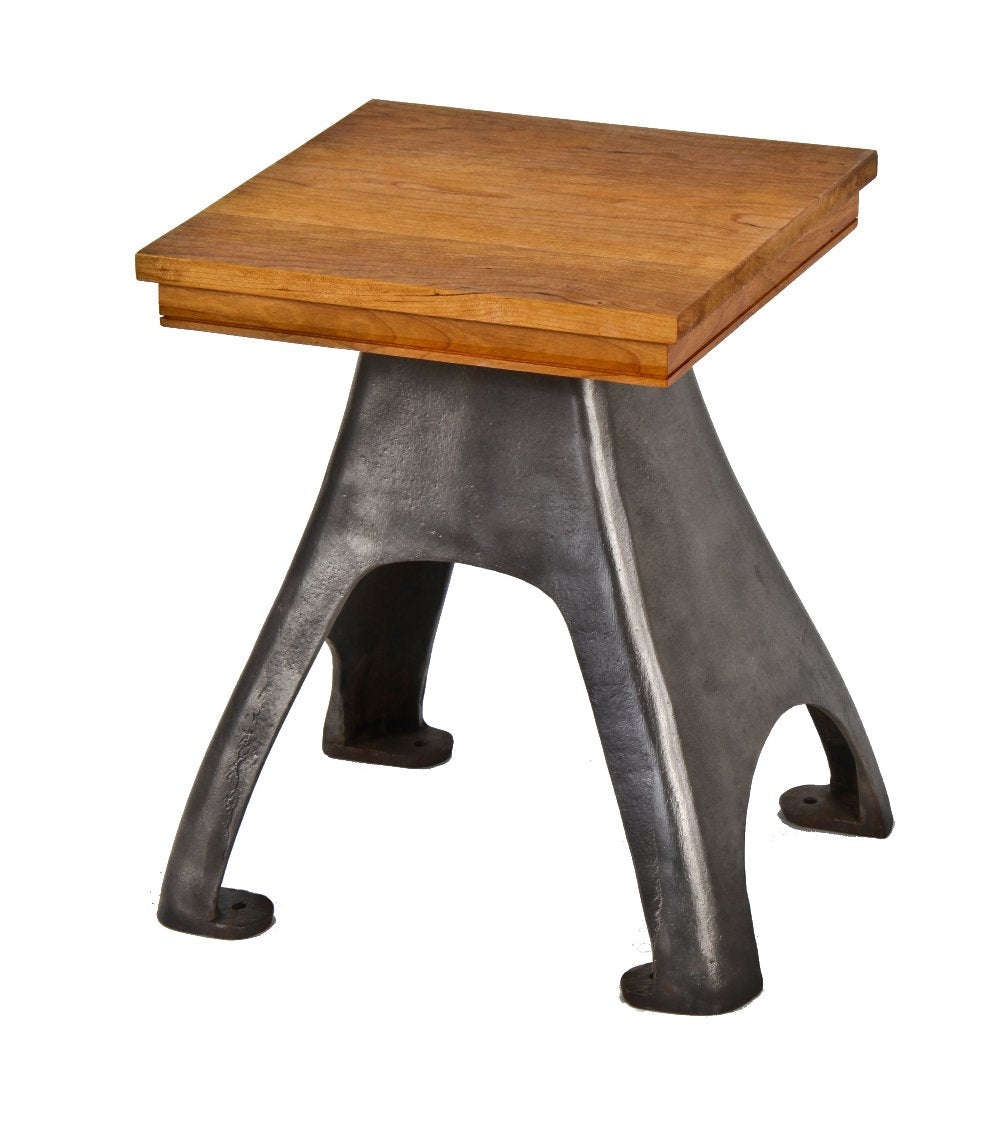 very clean and compact low-lying repurposed plant or display stand consisting of a cast iron machine base and cherry wood tabletop