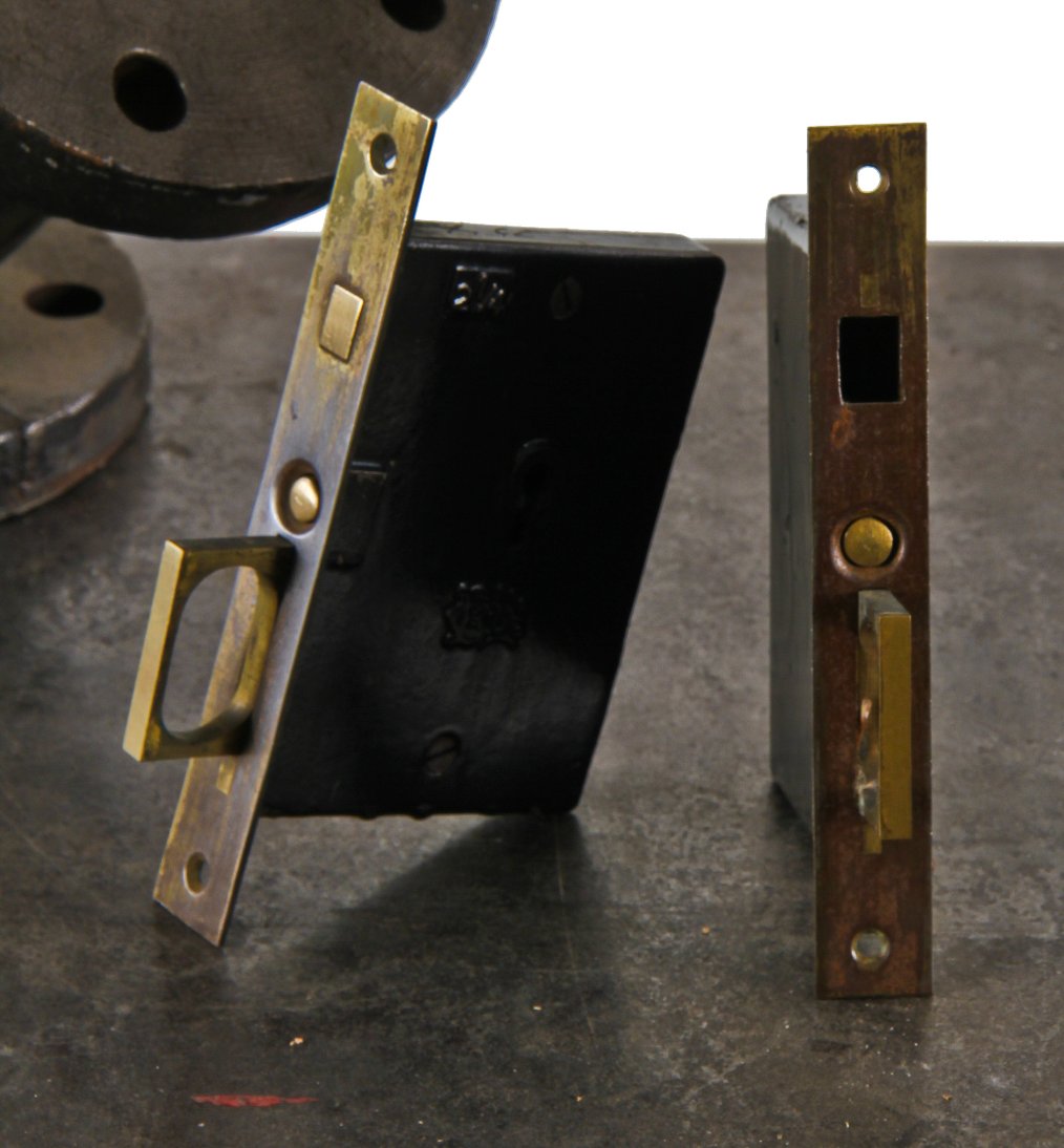 one early 20th century american antique interior residential pocket door mortise lock with brass face plate