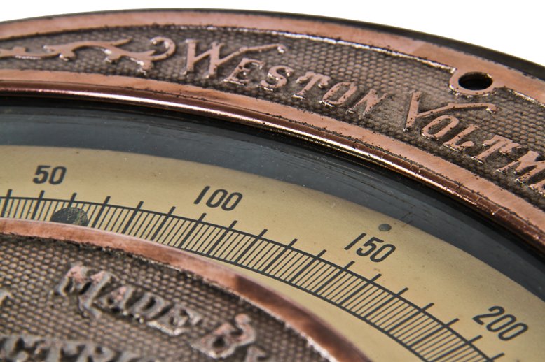 remarkably intact and highly sought after c. 1900-15 original american industrial weston ornamental cast iron analog volt meter with a partially intact copper-plated finish