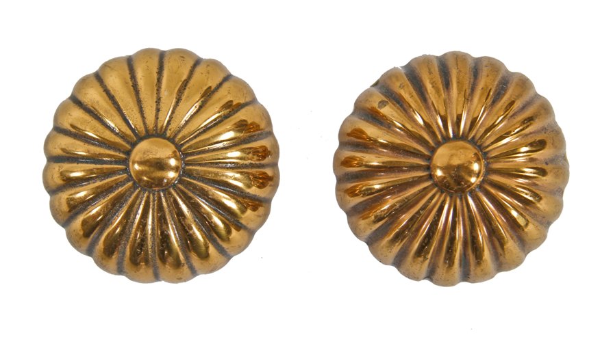matching set of late 19th century original interior residential ornamental cast bronze fluted doorknobs with centrally located buttons